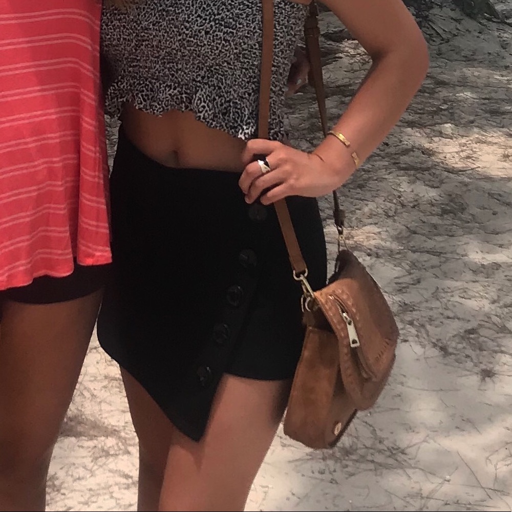 Side buttoned black skirt